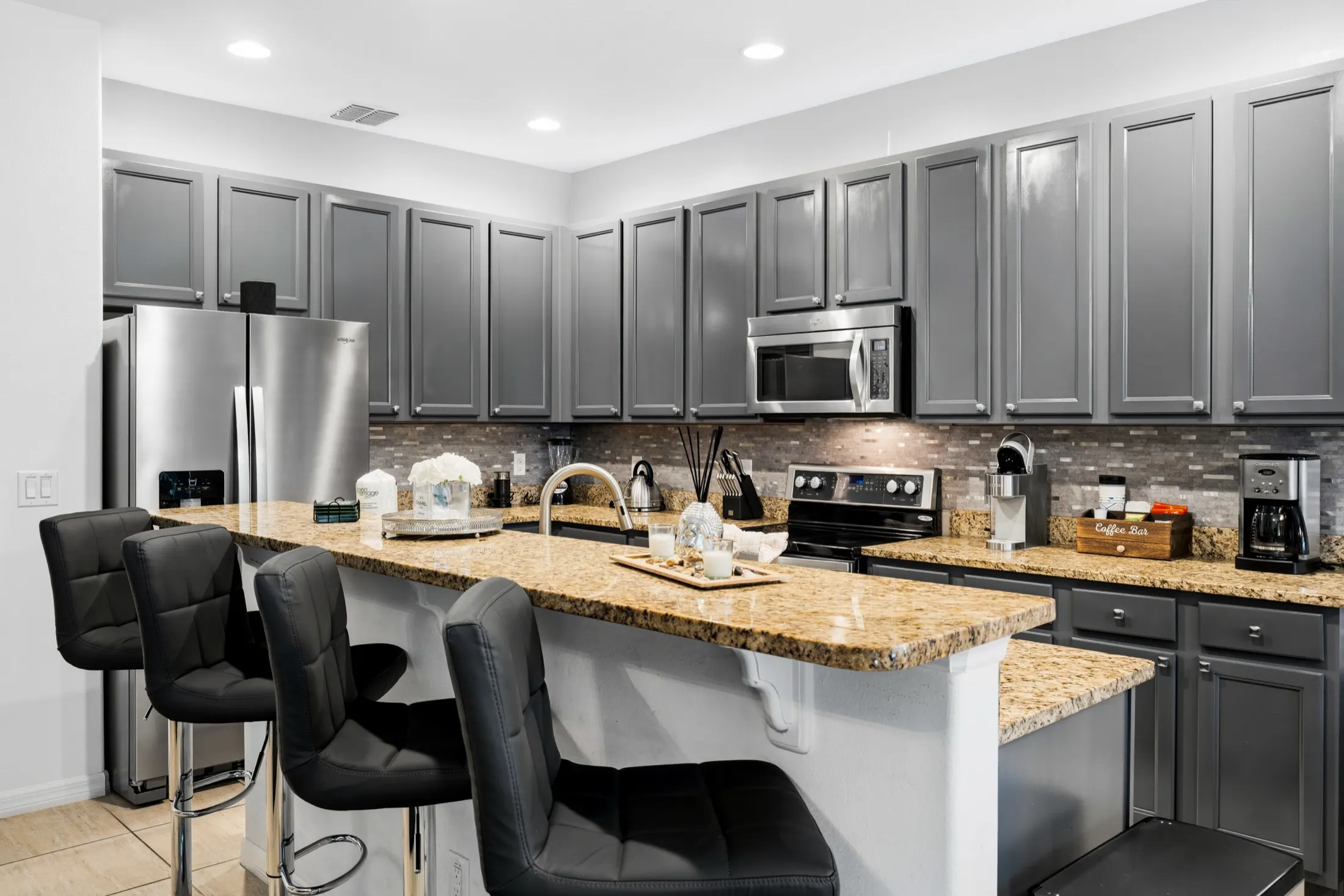 Kitchen, dining and living space at The Watersong Residence