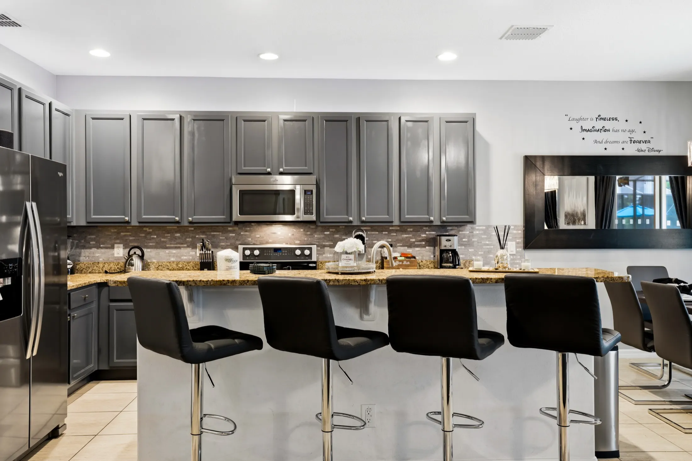 Kitchen, dining and living space at The Watersong Residence