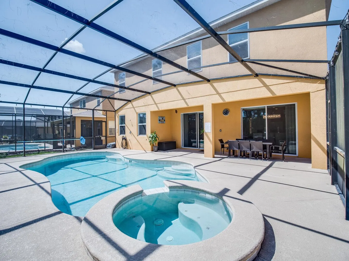 The private south-facing pool and spa at The Watersong Residence — view 4