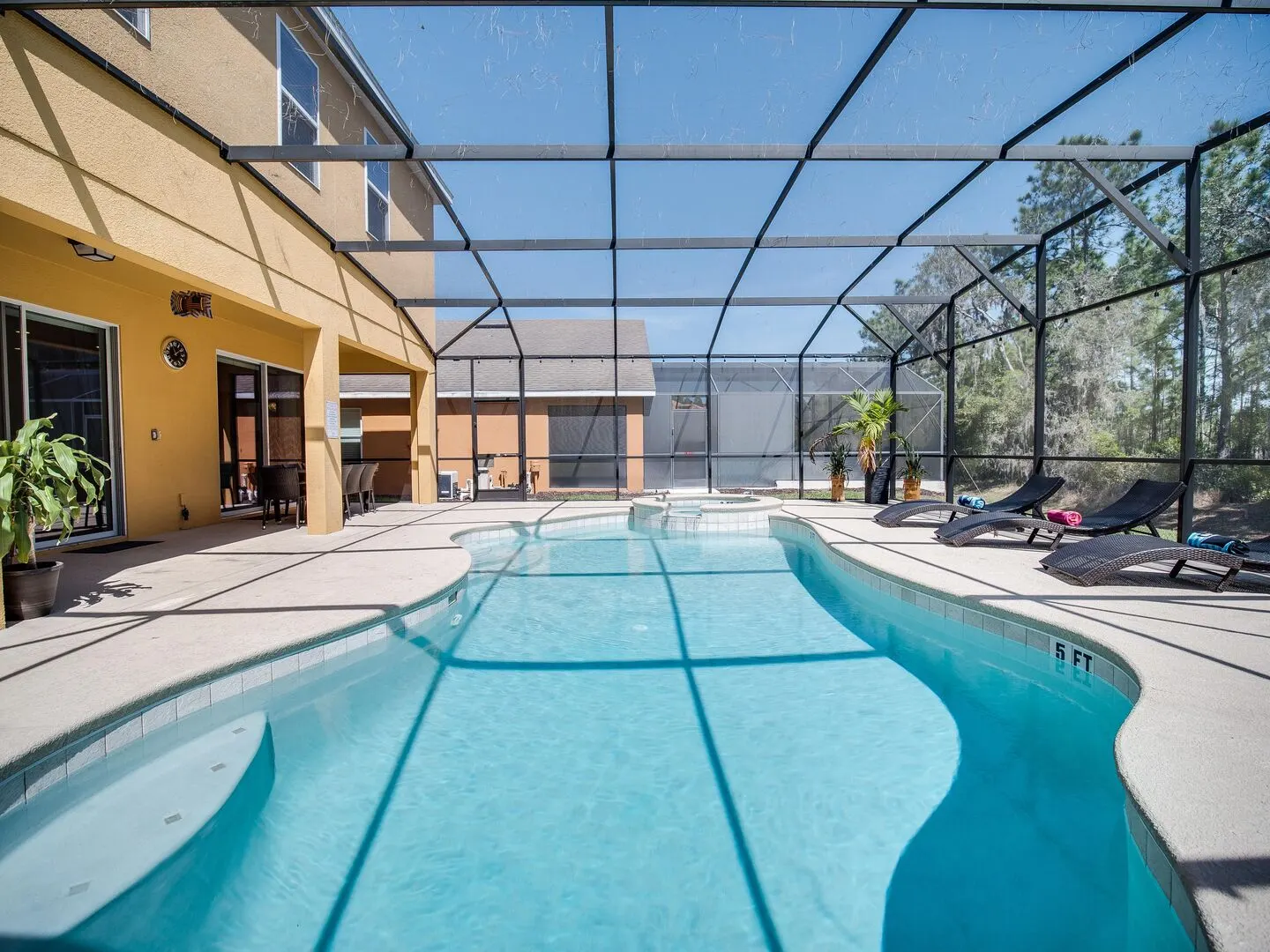 The private south-facing pool and spa at The Watersong Residence — view 9
